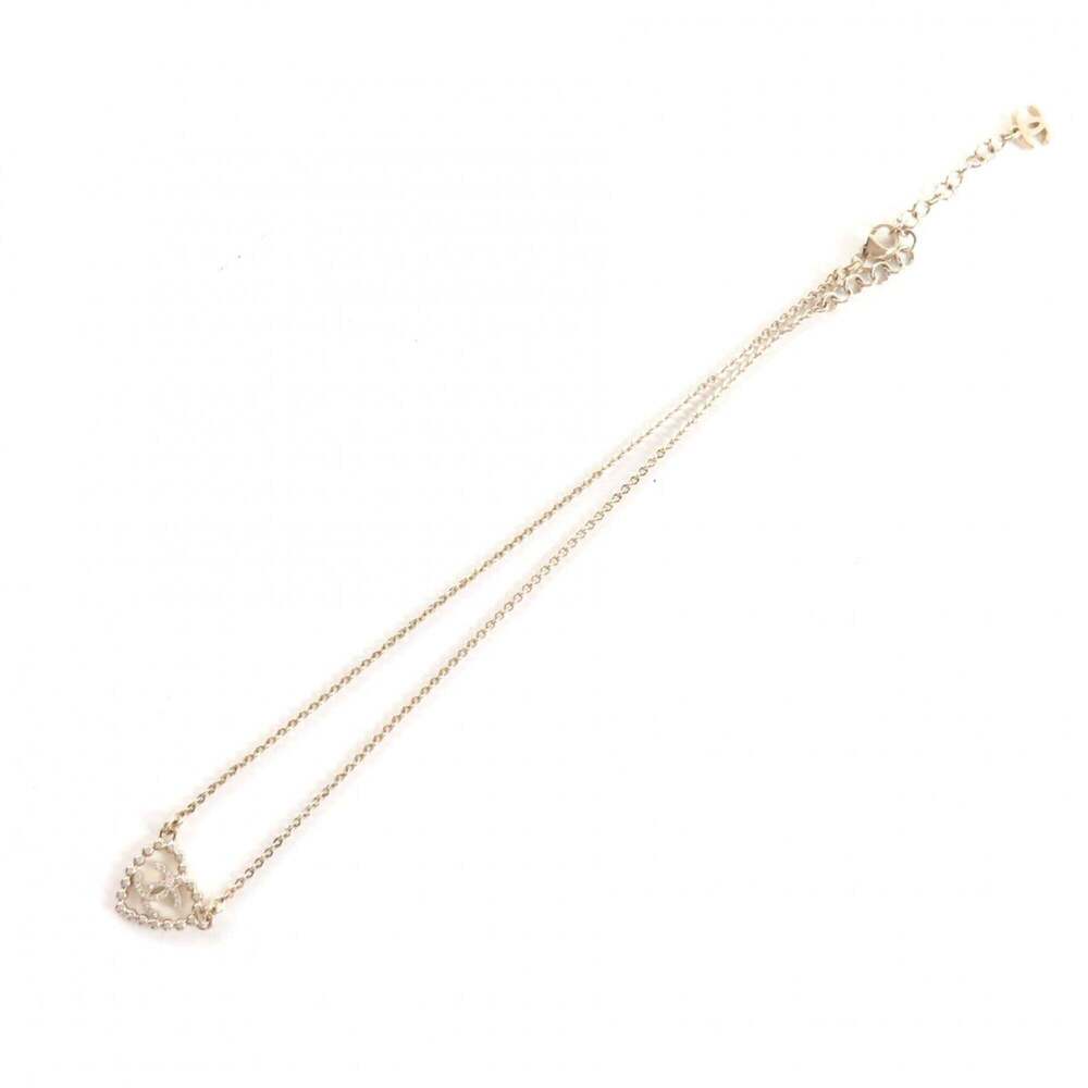 CHANEL Gold Logo Necklace - Picture 6 of 8